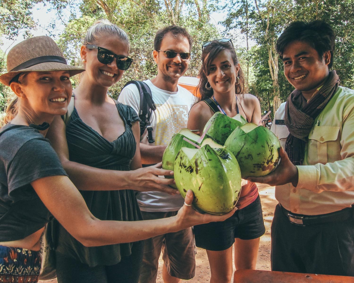 drinking coconuts in angkor wat