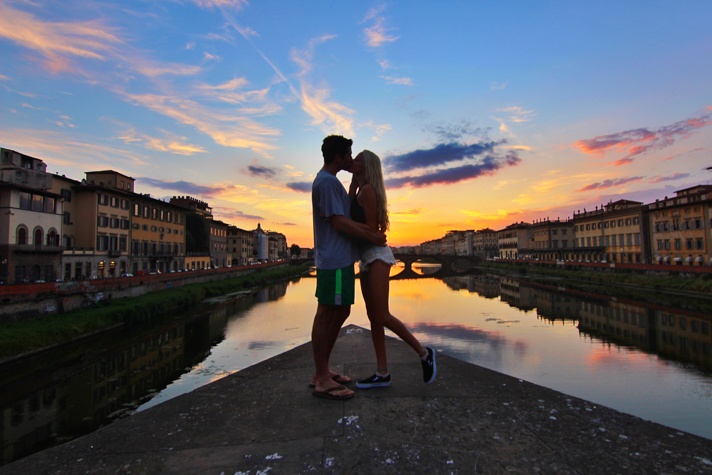 Couple kissing in Florence at Sunset