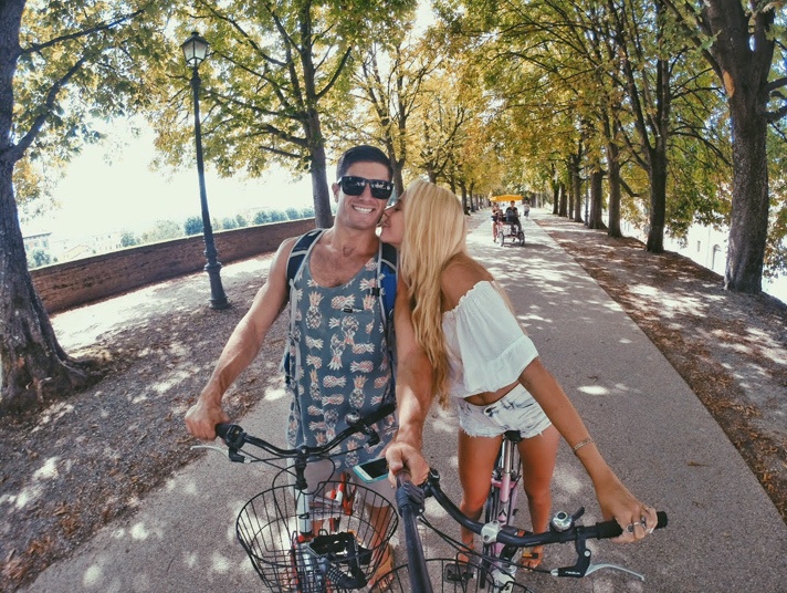 Couple on bike in Lucca Italy