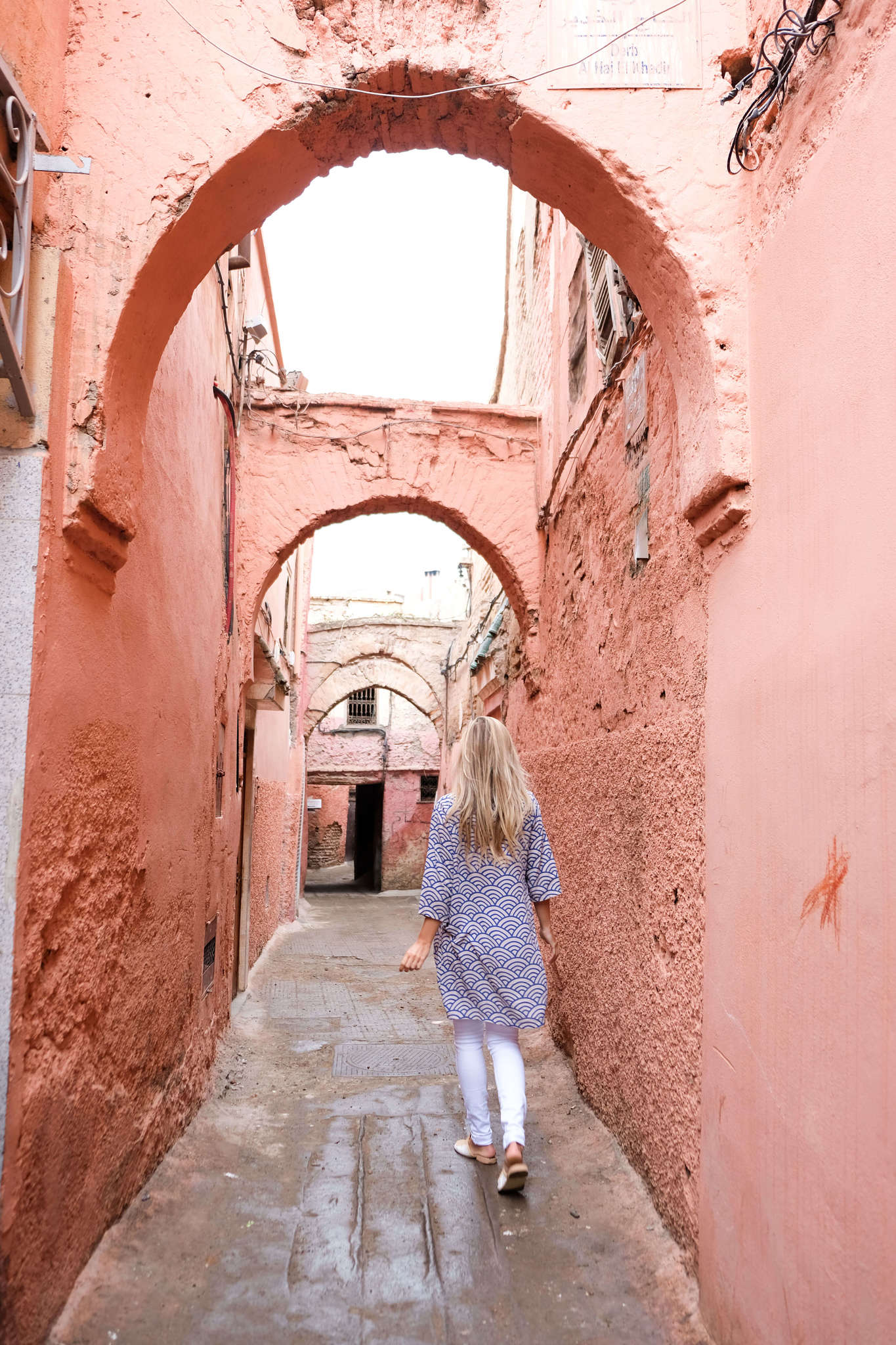 blonde walking in morocco