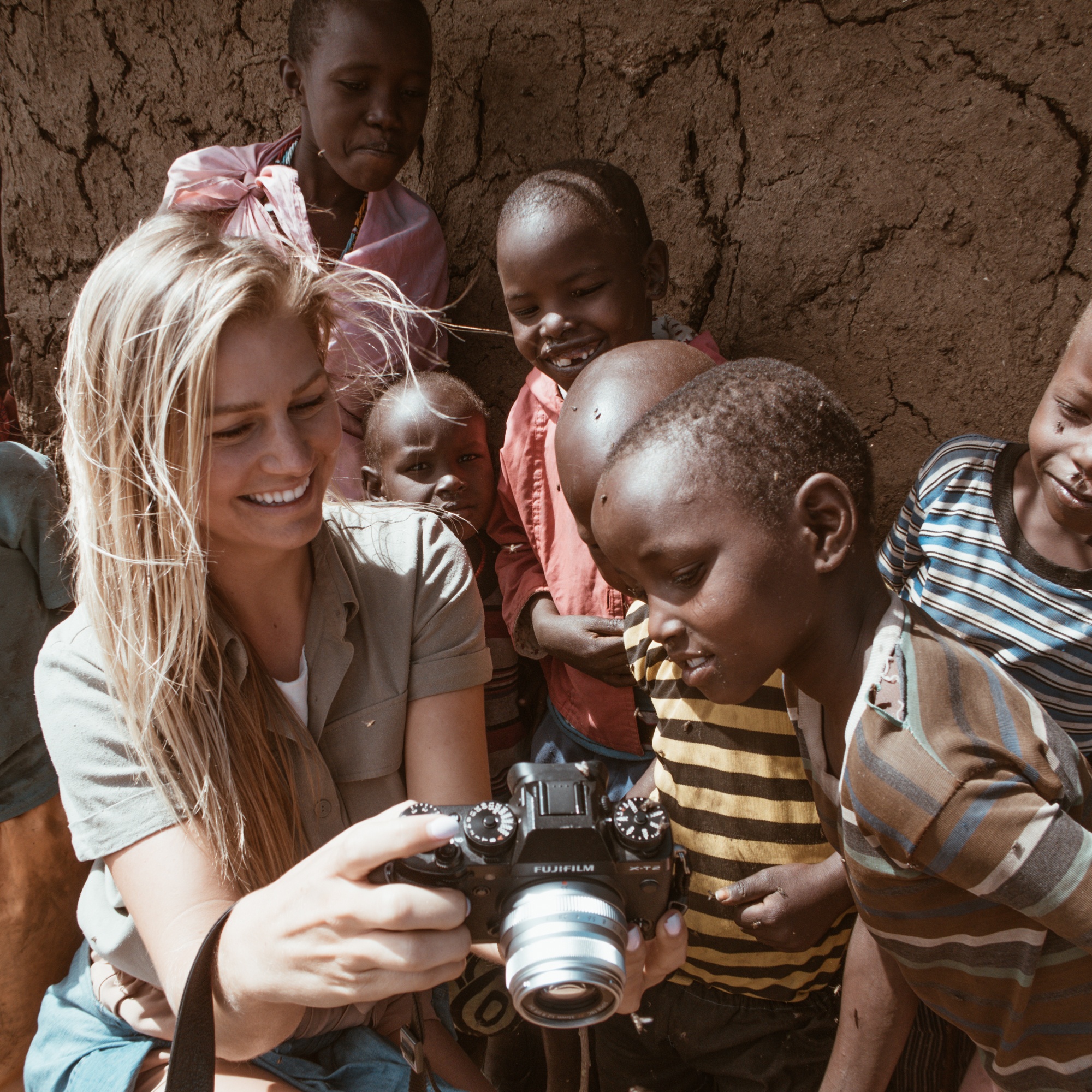 The Blonde Abroad with Maasai Children