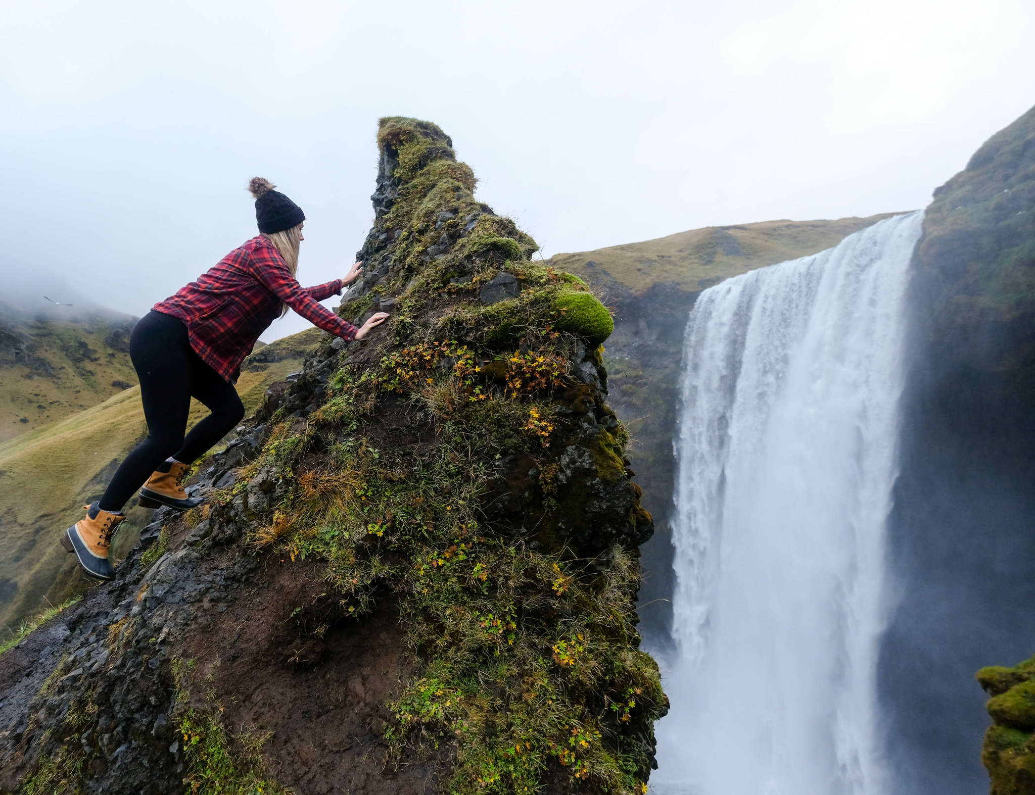 Climbing Skógafoss Waterfall, Iceland