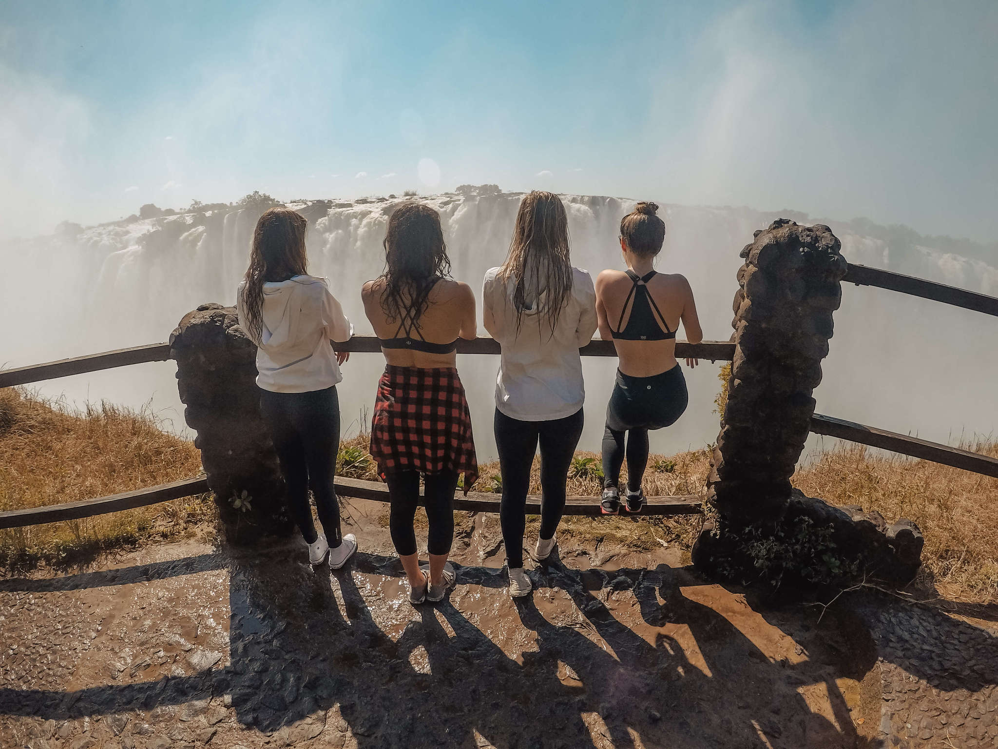 friends looking at victoria falls