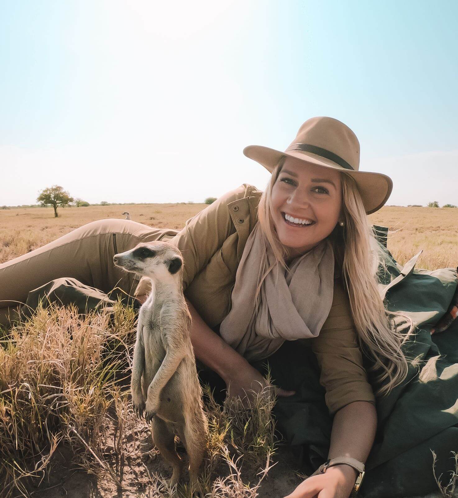 Blonde with Meerkat in Botswana