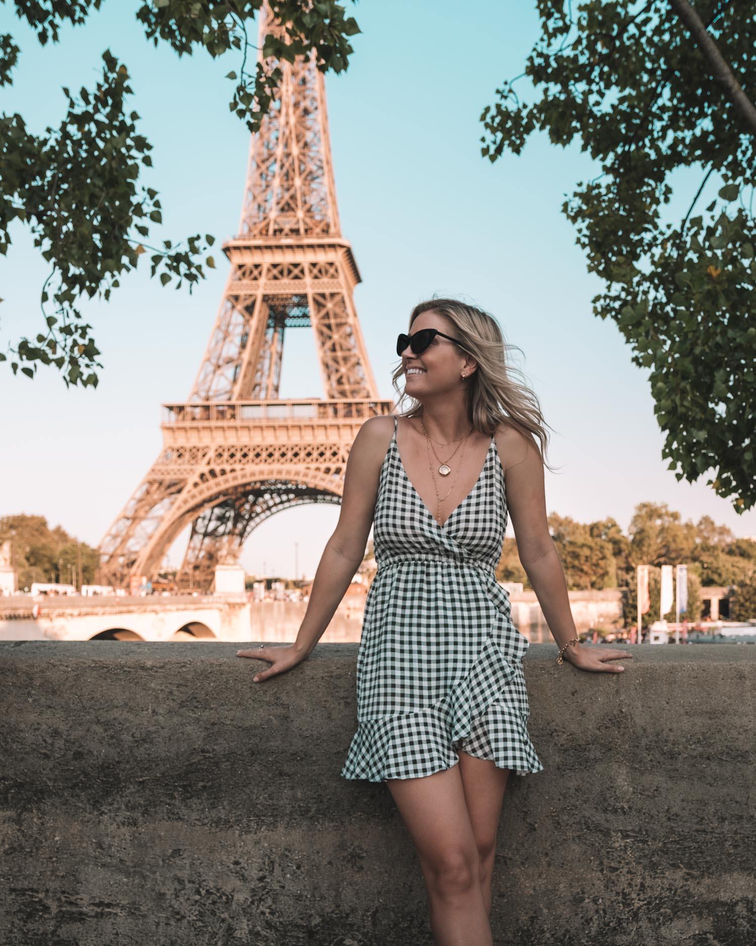 Blonde in front of Eiffel Tower in Paris
