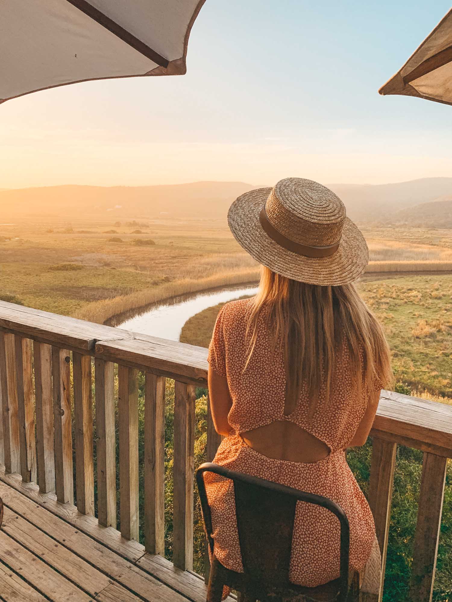 blonde watching the sunset